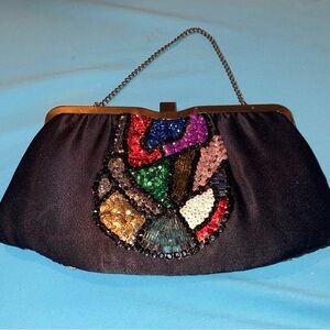 Ande vintage clutch wristlet w clasp , sequin pattern great condition multicolor
